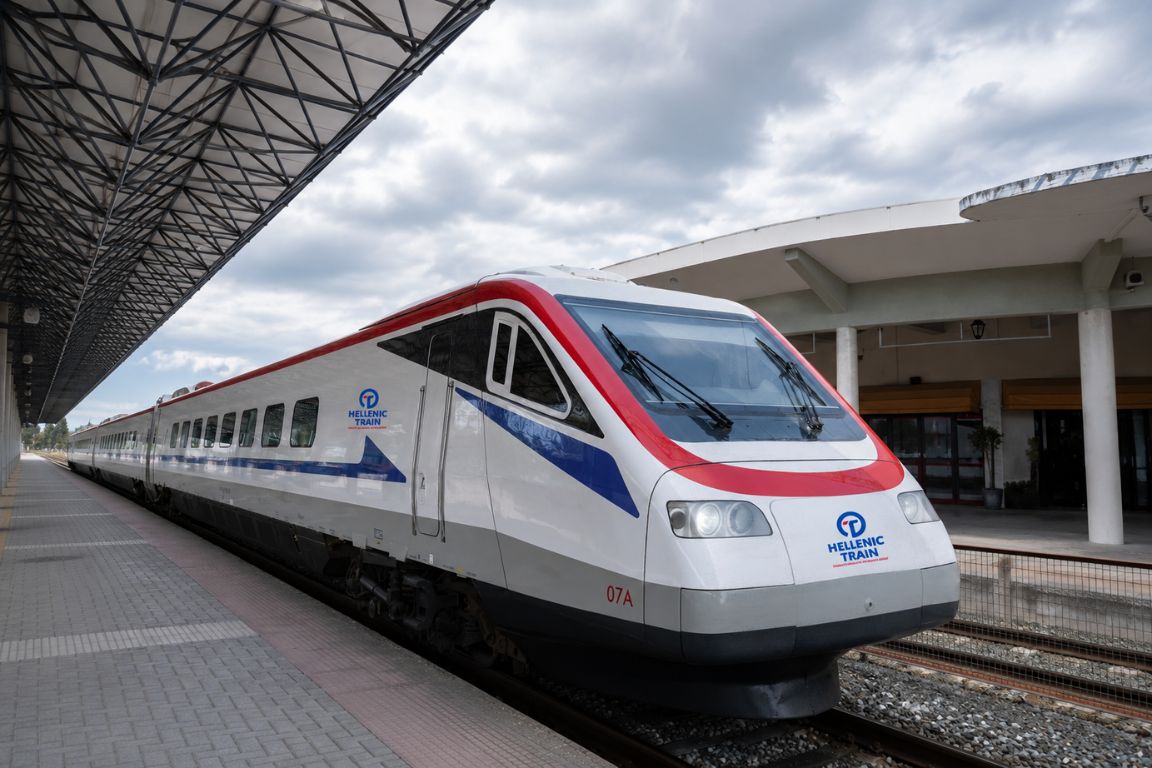 Modern Hellenic Train arriving at the railway station on the journey to Meteora, photographed during a guided tour with Meteora Tours